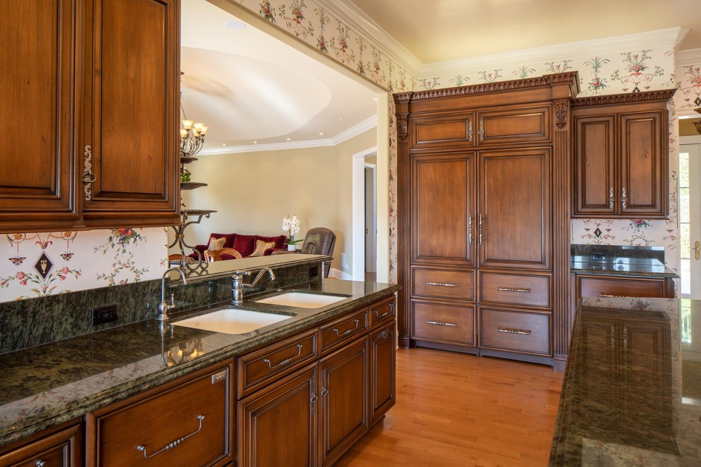 14501 Roland Canyon Road Salinas, CA 93908 - Photo 20 of 53 a kitchen with stainless steel appliances granite countertop a sink stove and refrigerator