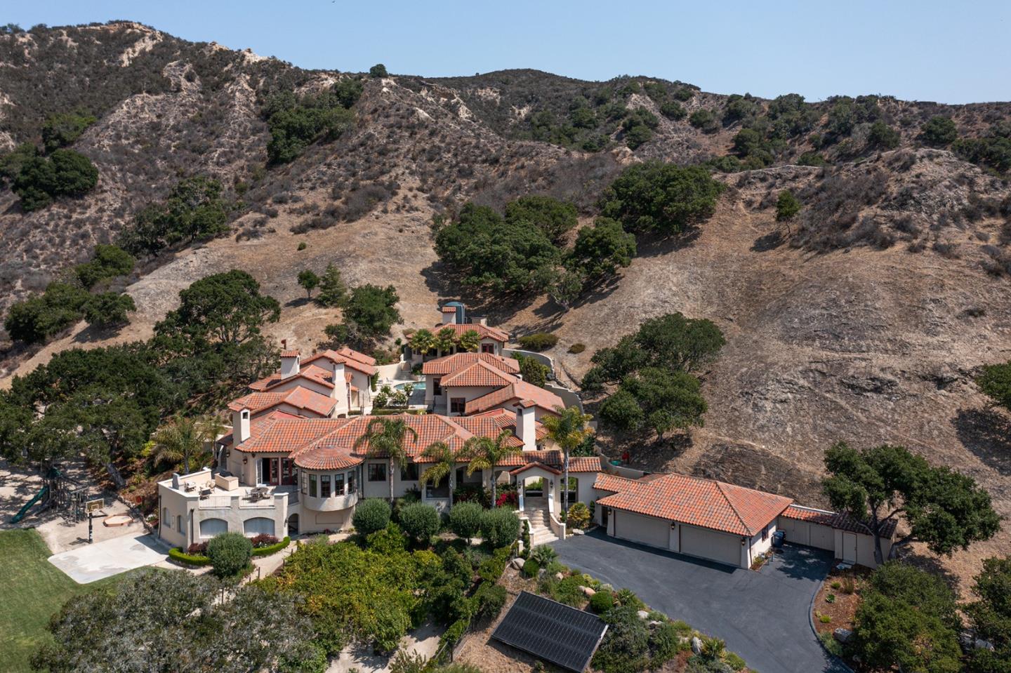 14501 Roland Canyon Road Salinas, CA 93908 - Photo 3 of 53 an aerial view of a house with mountain view