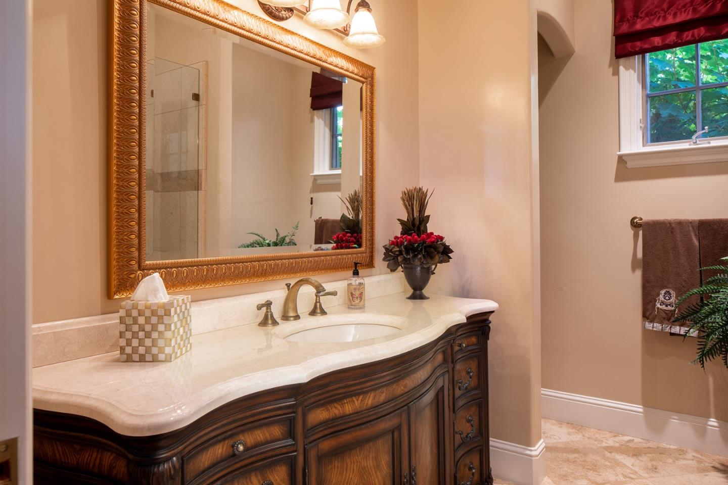 14501 Roland Canyon Road Salinas, CA 93908 - Photo 28 of 53 a bathroom with a sink and a mirror