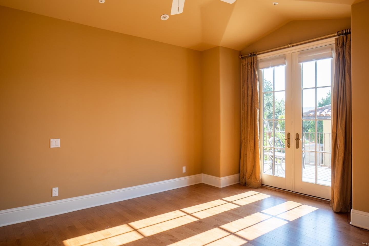 14501 Roland Canyon Road Salinas, CA 93908 - Photo 32 of 53 a view of an empty room with glass door and a window