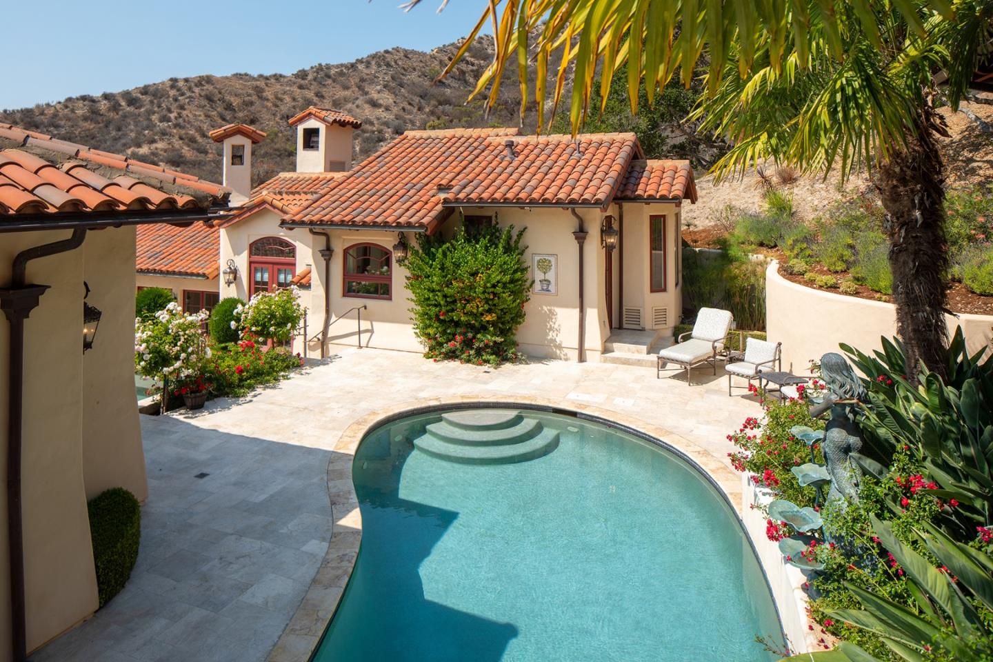 14501 Roland Canyon Road Salinas, CA 93908 - Photo 35 of 53 a view of a house with a swimming pool
