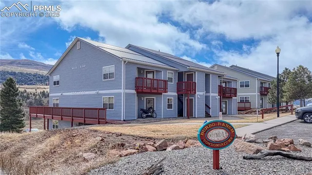 a front view of a house with street space