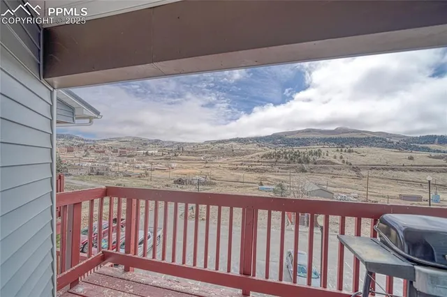 a balcony with an outdoor space