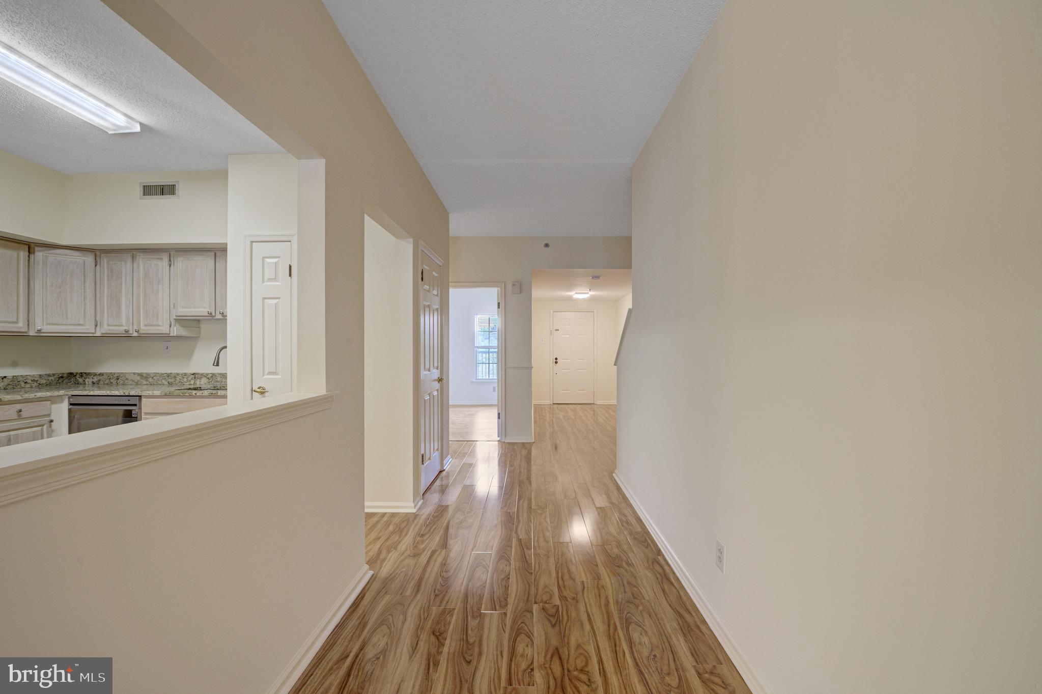 6146 Main Street Voorhees, NJ 08043 - Photo 15 of 40 a view of a kitchen with wooden floor