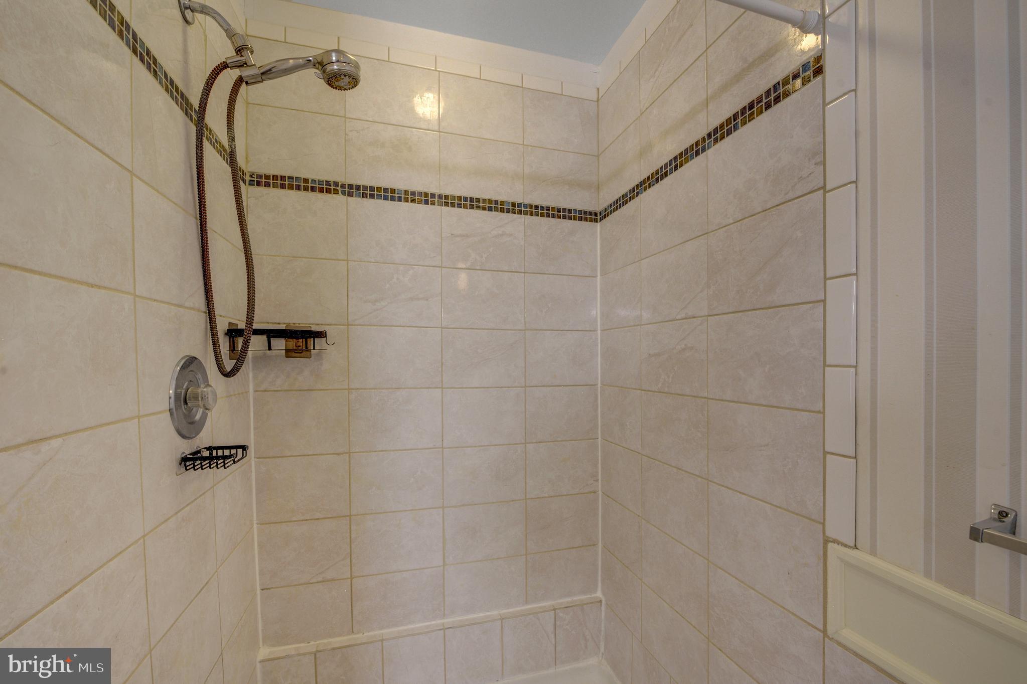 6146 Main Street Voorhees, NJ 08043 - Photo 24 of 40 a bathroom with a shower