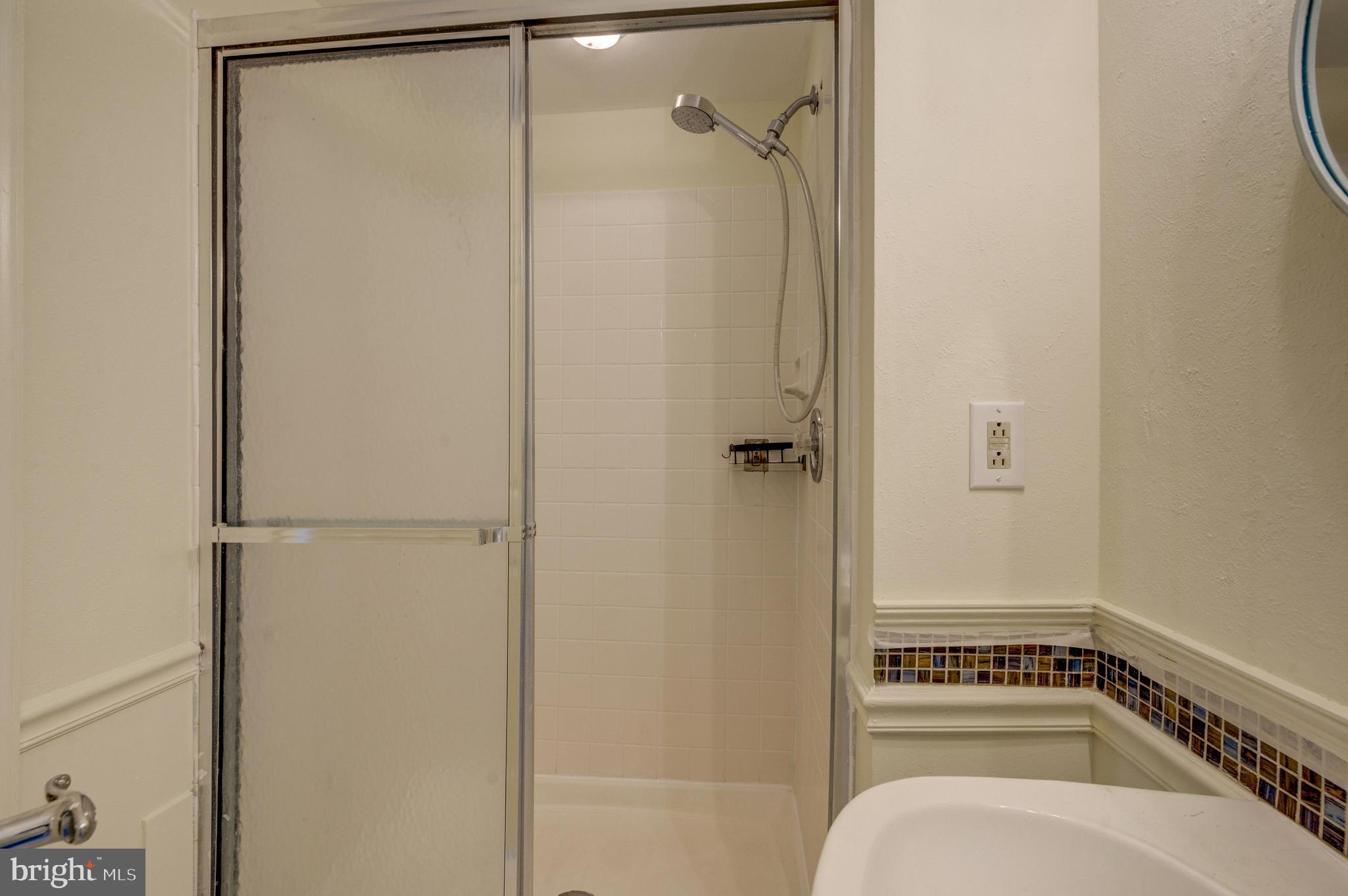 6146 Main Street Voorhees, NJ 08043 - Photo 31 of 40 a bathroom with a shower and toilet