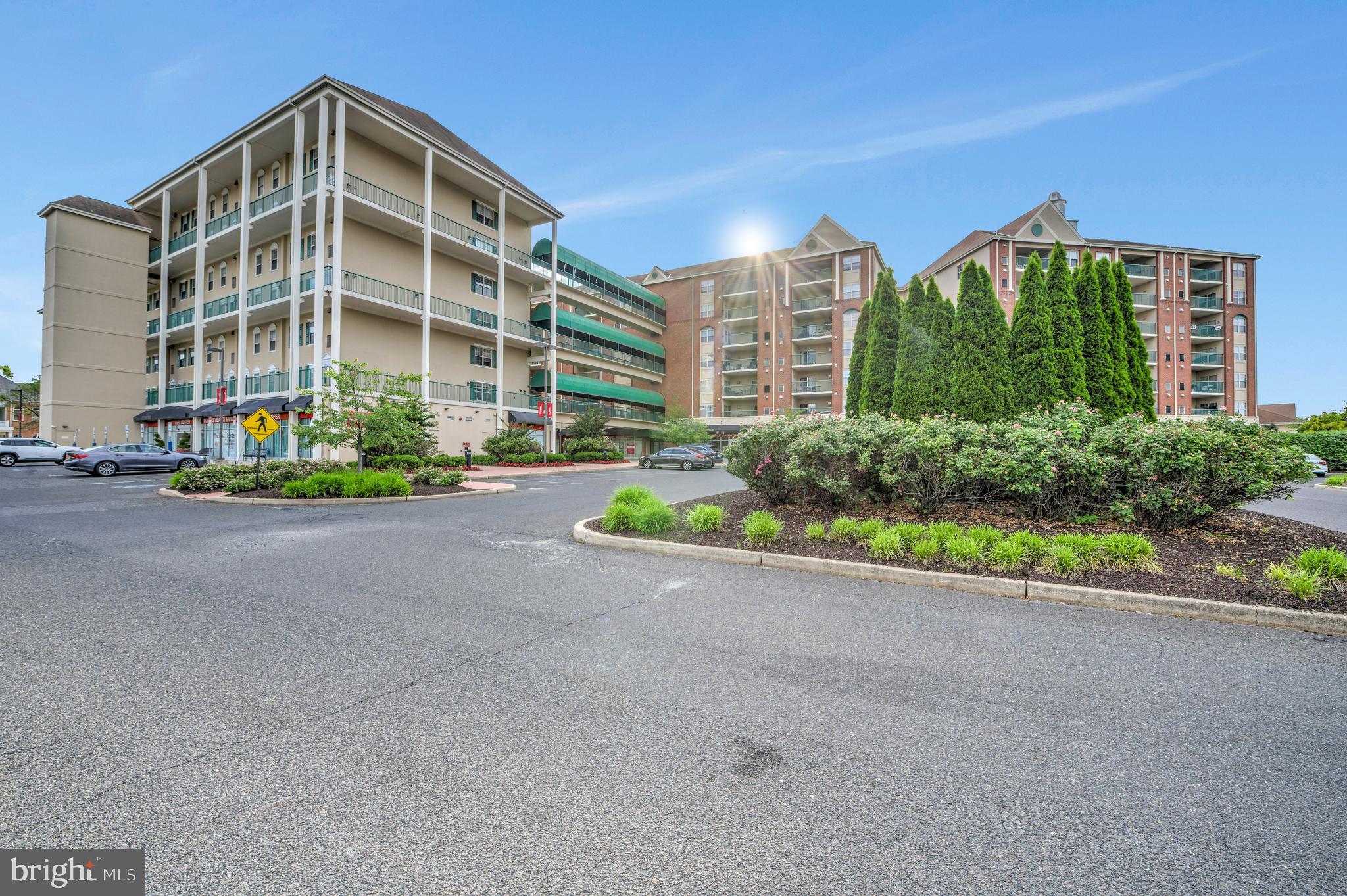 6146 Main Street Voorhees, NJ 08043 - Photo 40 of 40 a front view of a building with garden and plants
