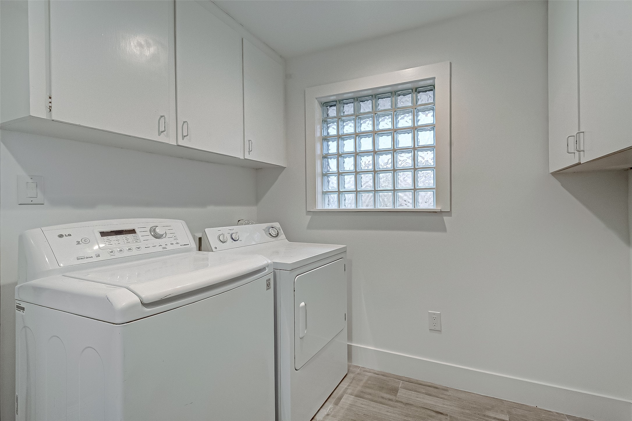 5007 Cheena Drive Houston, TX 77096 - Photo 17 of 40 a utility room with dryer and washer