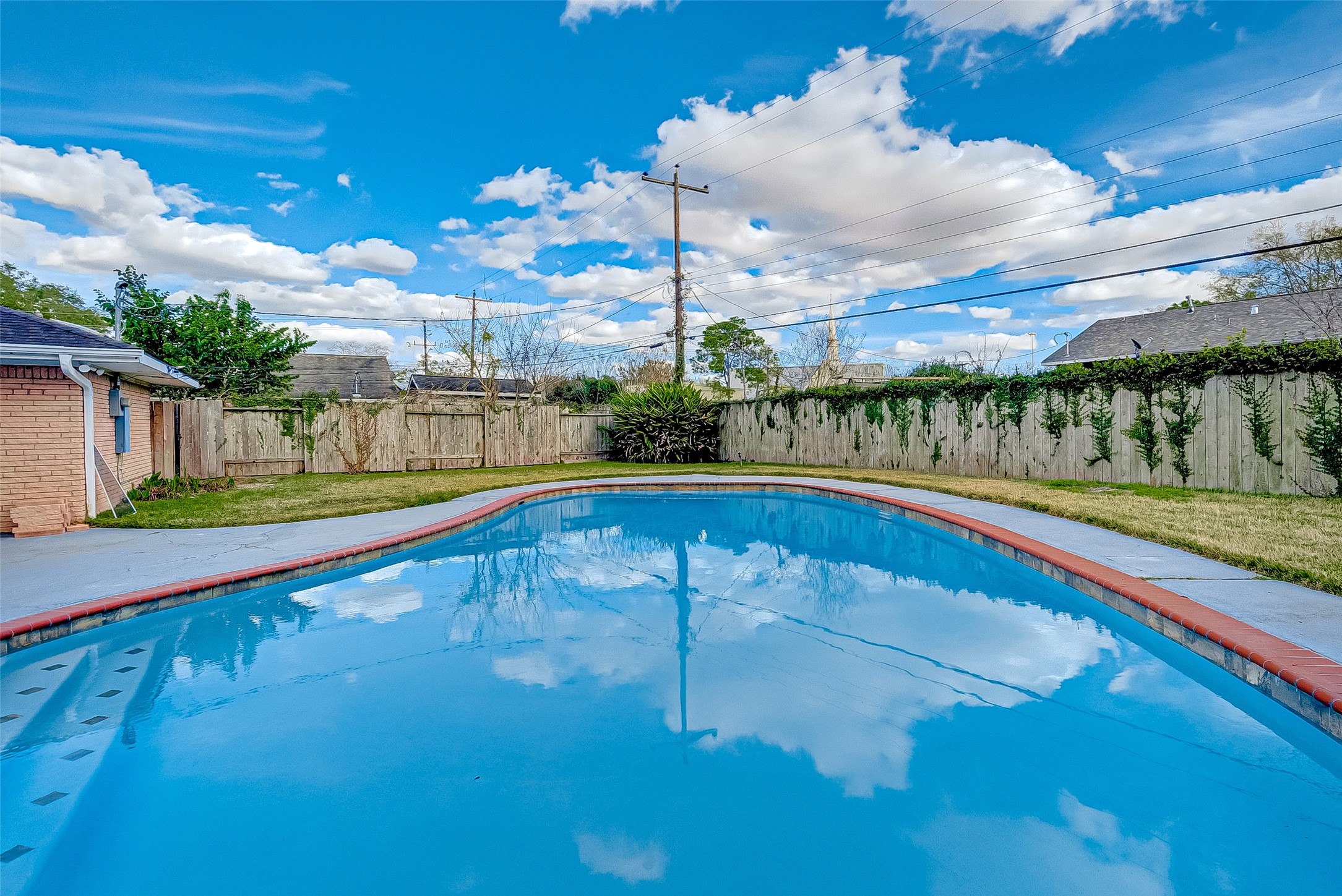 5007 Cheena Drive Houston, TX 77096 - Photo 34 of 40 a view of swimming pool with a patio