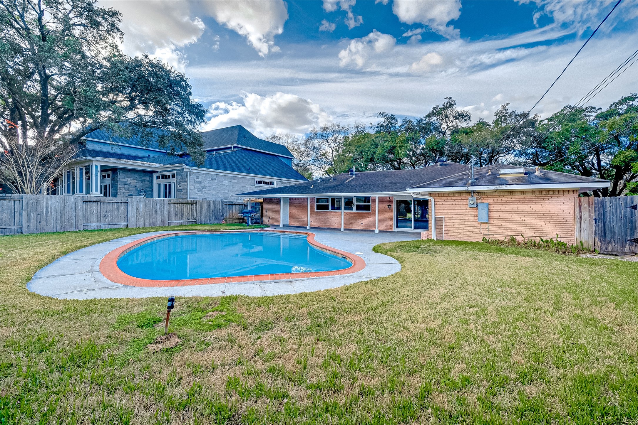 5007 Cheena Drive Houston, TX 77096 - Photo 37 of 40 a view of house with swimming pool outdoor seating