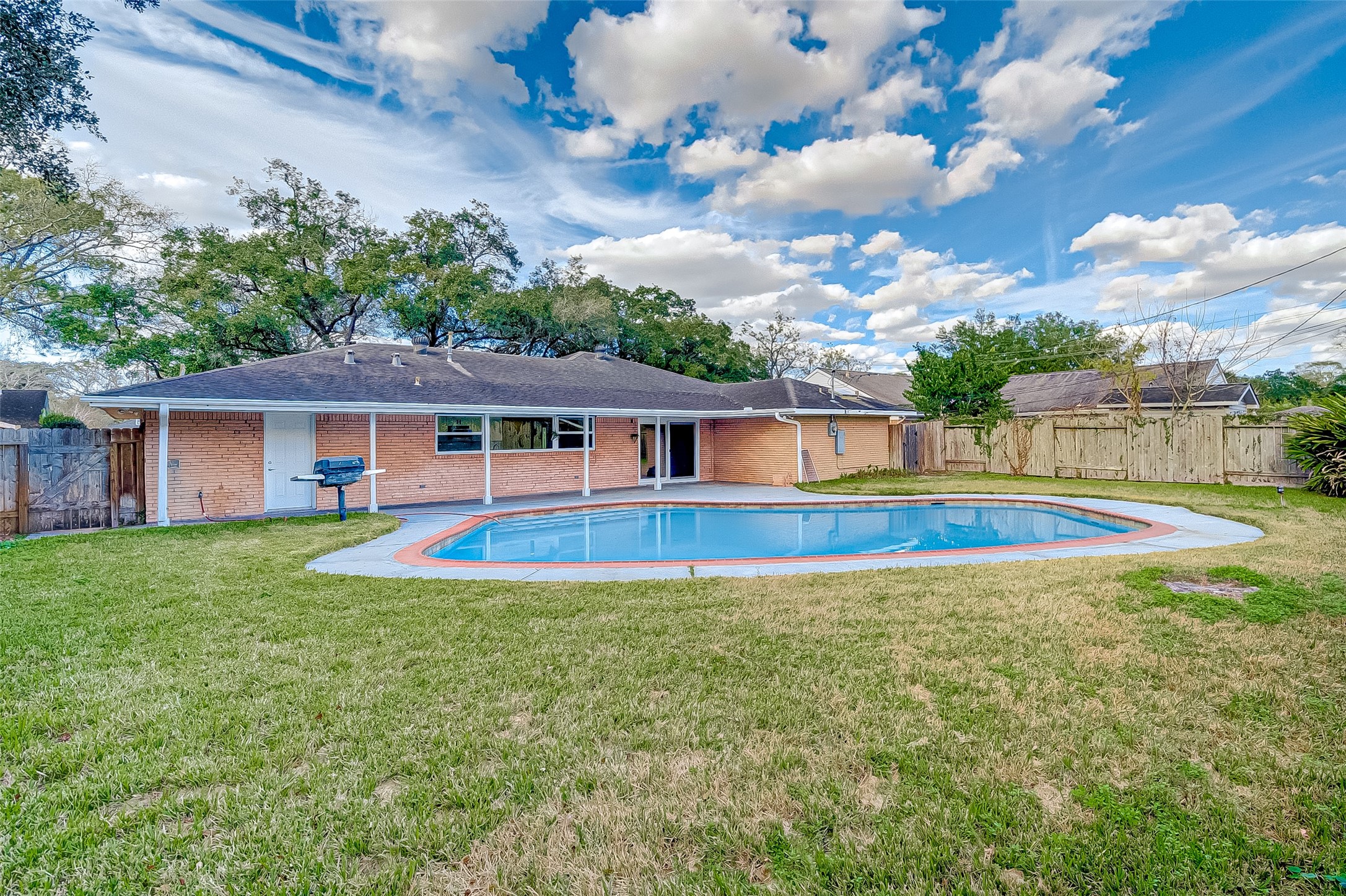 5007 Cheena Drive Houston, TX 77096 - Photo 39 of 40 a view of pool with a yard