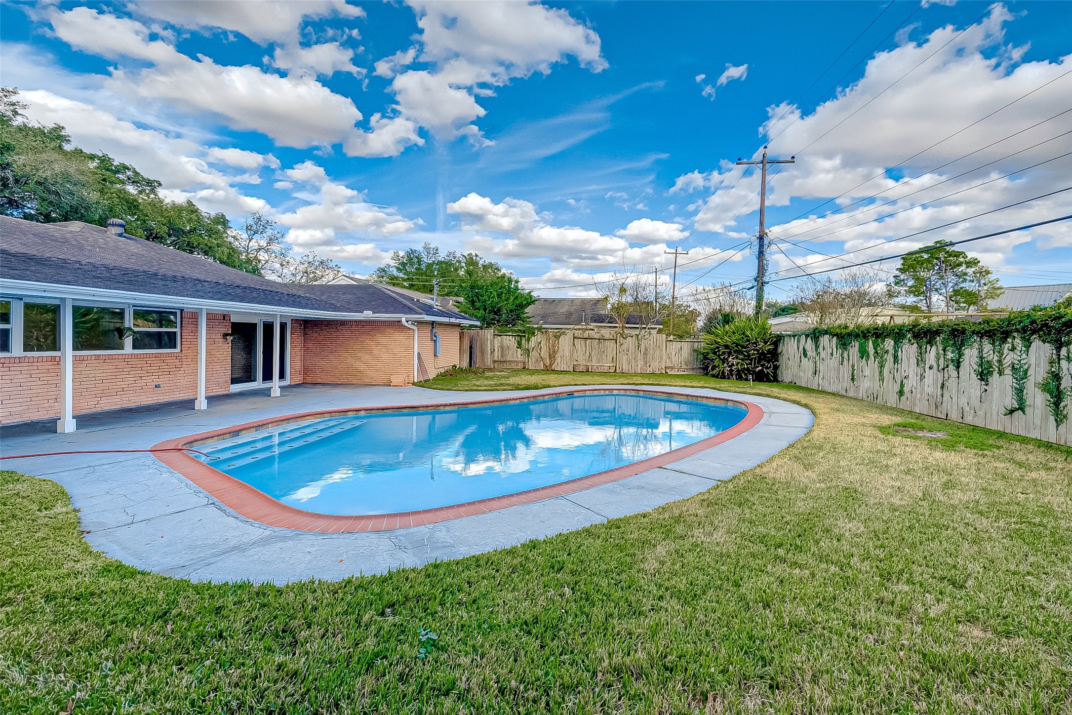 5007 Cheena Drive Houston, TX 77096 - Photo 40 of 40 a view of outdoor space yard and swimming pool