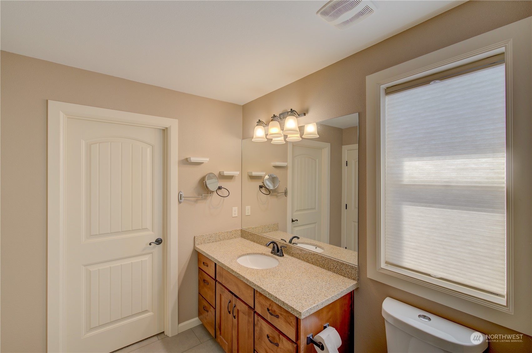 206 Pioneer Road West Long Beach, WA 98631 - Photo 16 of 39 a bathroom with a sink and a mirror