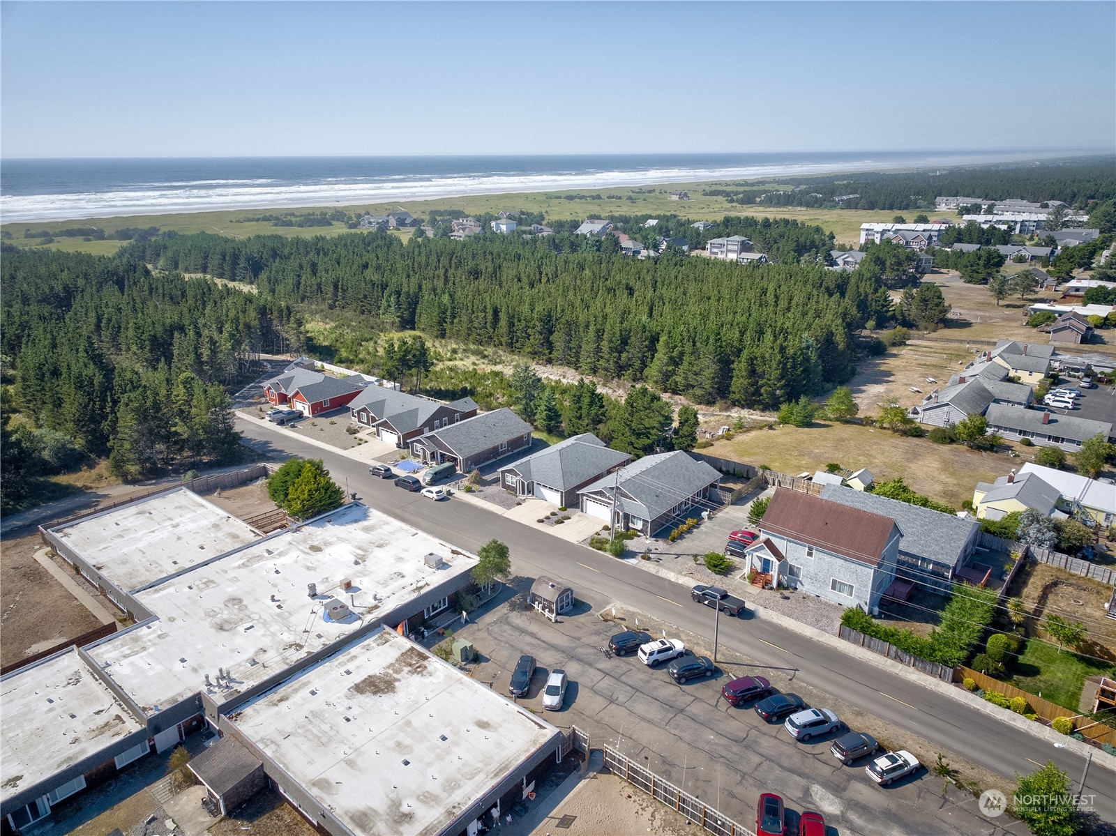 206 Pioneer Road West Long Beach, WA 98631 - Photo 2 of 39 an aerial view of a city with lots of residential buildings