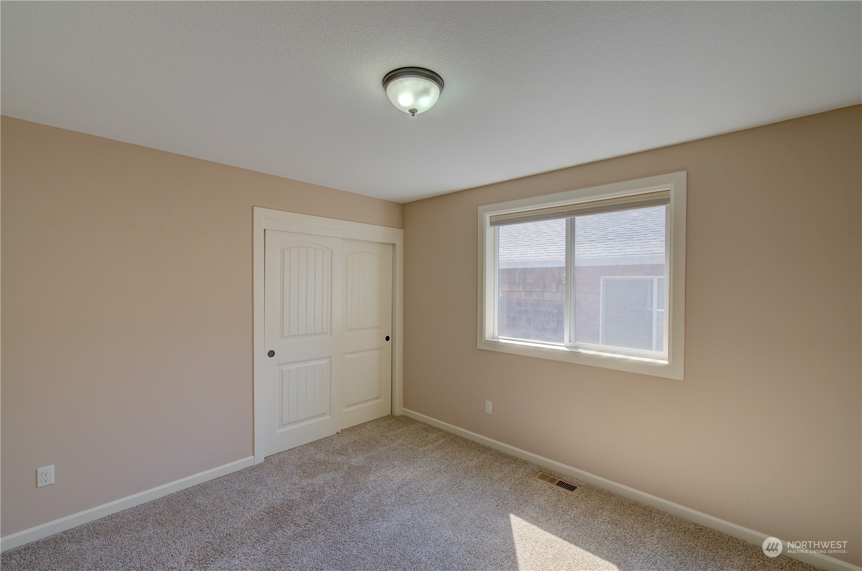 206 Pioneer Road West Long Beach, WA 98631 - Photo 22 of 39 an empty room with windows