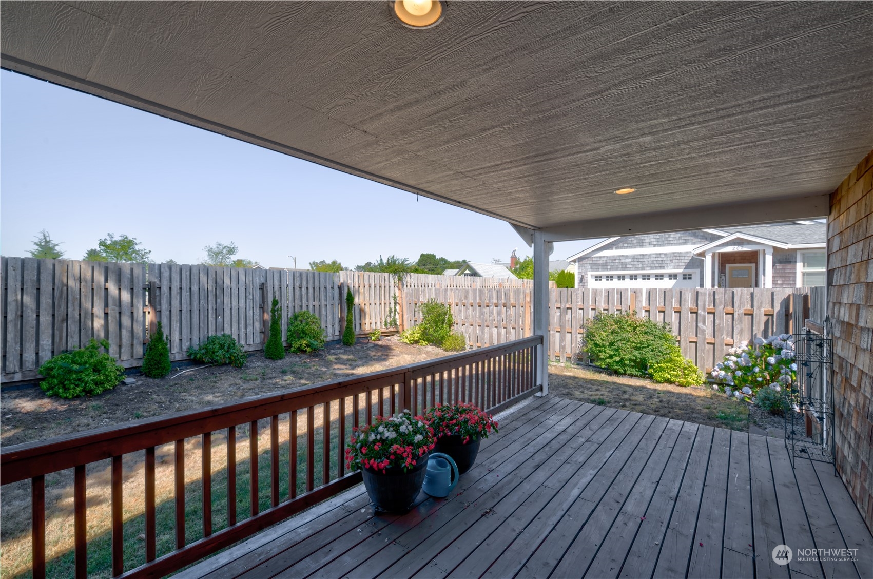 206 Pioneer Road West Long Beach, WA 98631 - Photo 30 of 39 a view of a balcony with wooden floor