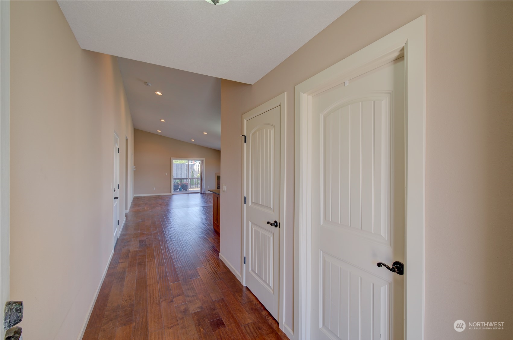 206 Pioneer Road West Long Beach, WA 98631 - Photo 4 of 39 a view of a hallway with wooden floor