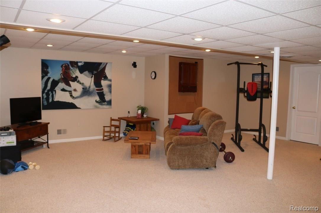 1983 Blue Grass Court Rochester, MI 48306 - Photo 36 of 46 CHECK OUT ALL OF THE RECESSED LIGHTS IN THE FINISHED BASEMENT!
