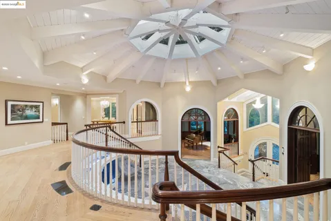 a view of hall way with furniture