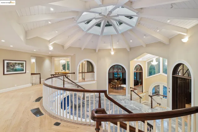 a view of hall way with furniture