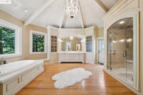 a view of a patio with table and chairs