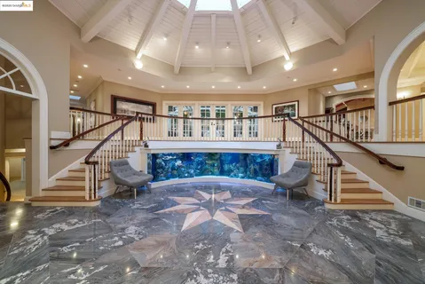a view of entryway livingroom and hall
