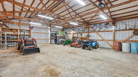 a view of a garage with a table and chairs