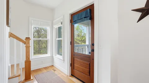 a view of an entryway with a livingroom