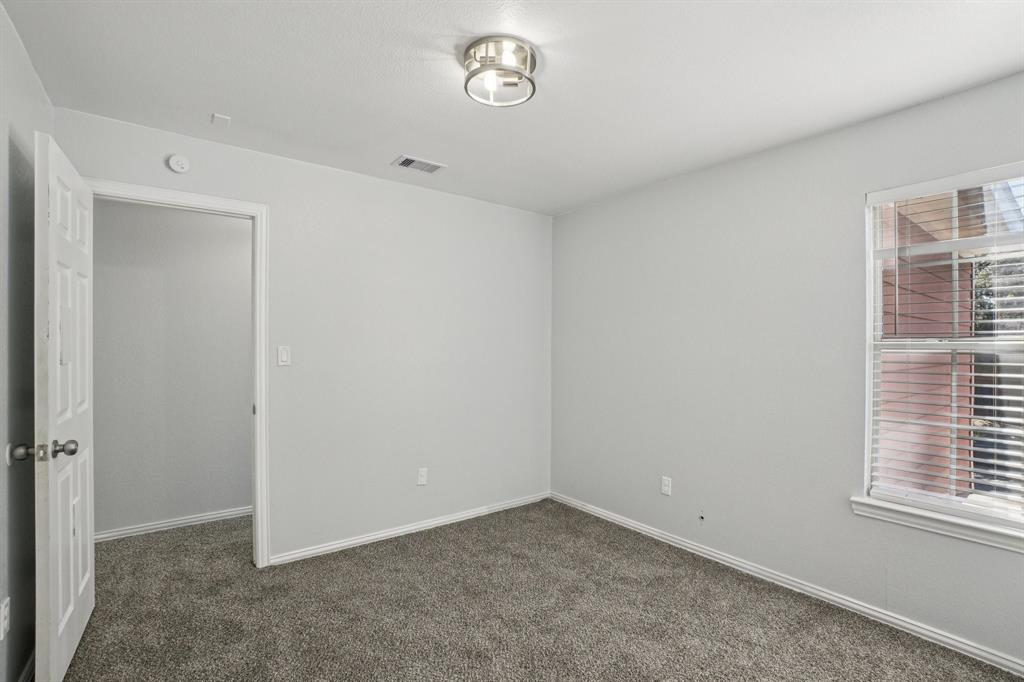 4021 Preferred Place Dallas, TX 75237 - Photo 20 of 25 a view of an empty room with a window