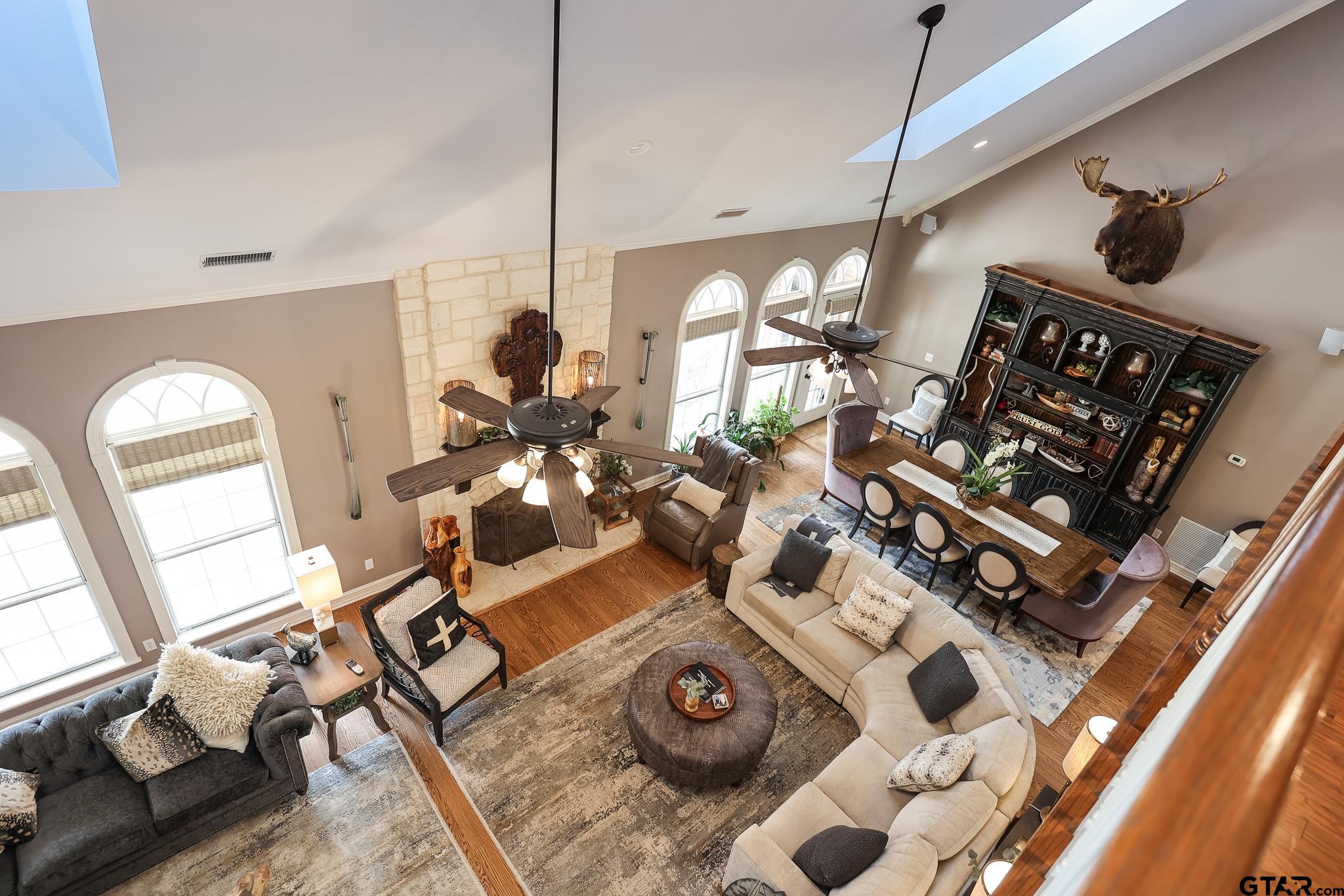 1415 West Sabine Street Carthage, TX 75633 - Photo 19 of 44 a living room with furniture and wooden floor