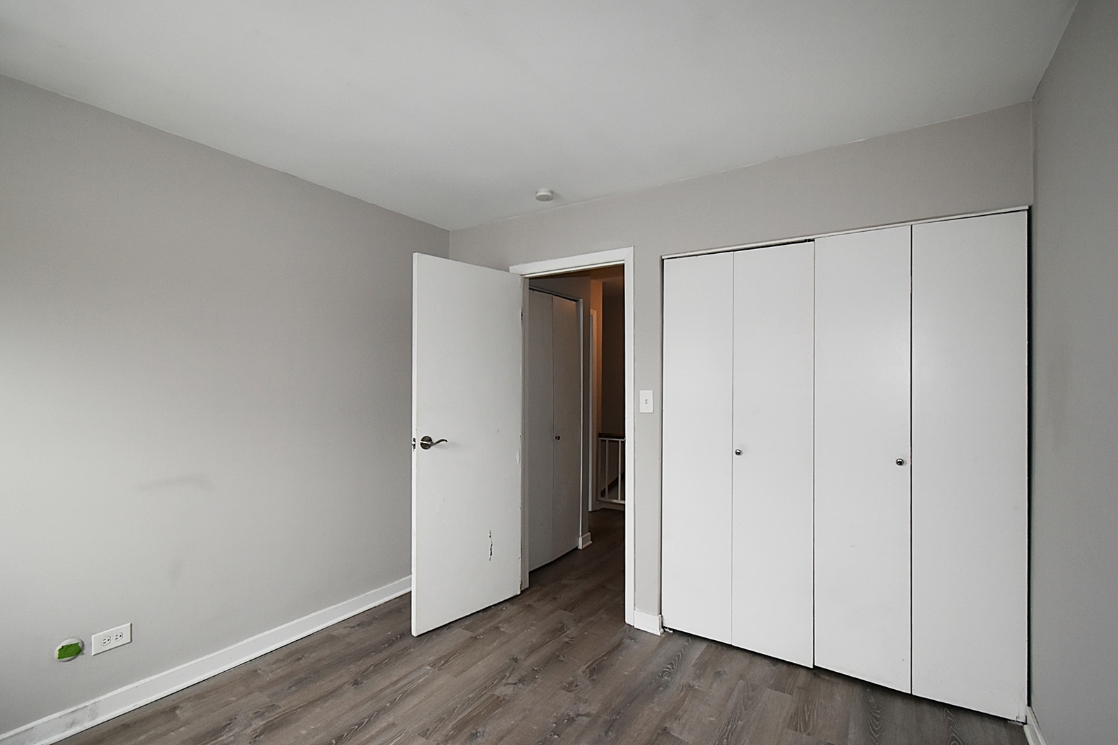 1362 South Glen Circle, Unit A Aurora, IL 60506 - Photo 12 of 17 a view of an empty room with wooden floor