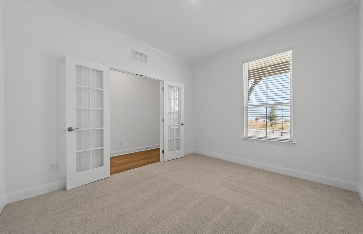 501 Maries Garden Georgetown, TX 78626 - Photo 16 of 24 a view of an empty room with a window