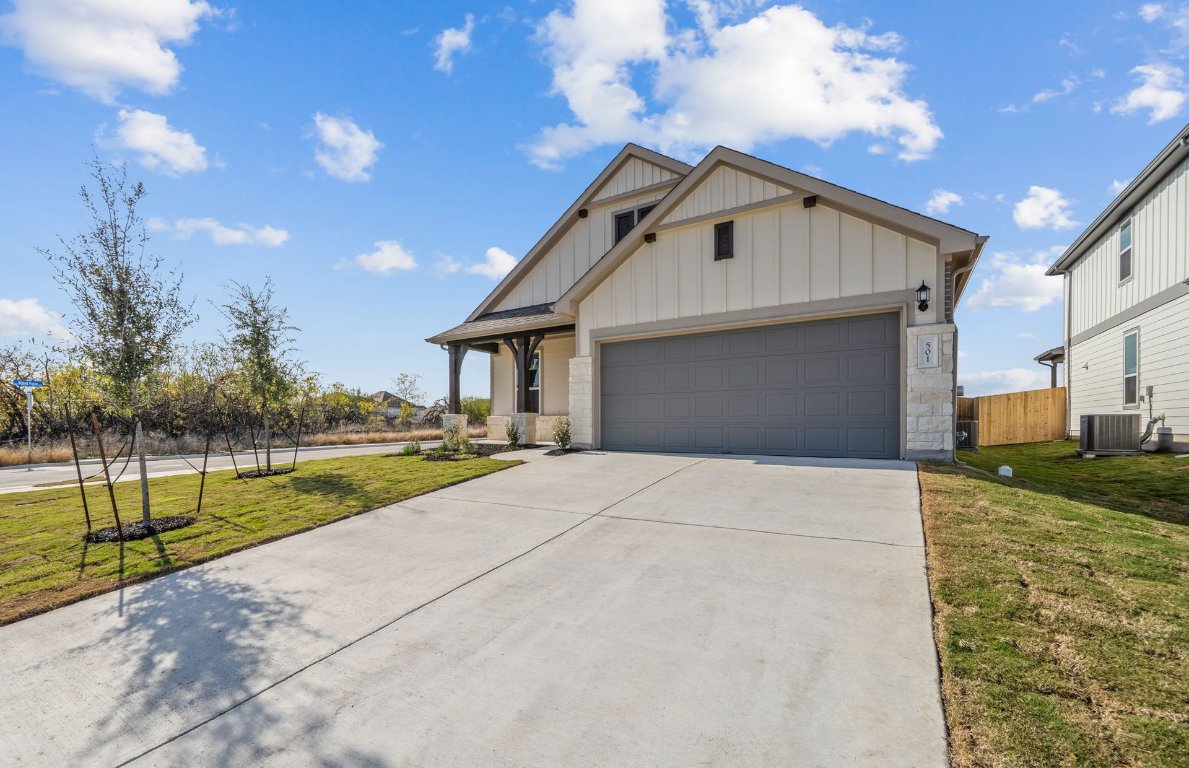 501 Maries Garden Georgetown, TX 78626 - Photo 2 of 24 a view of a house with a yard