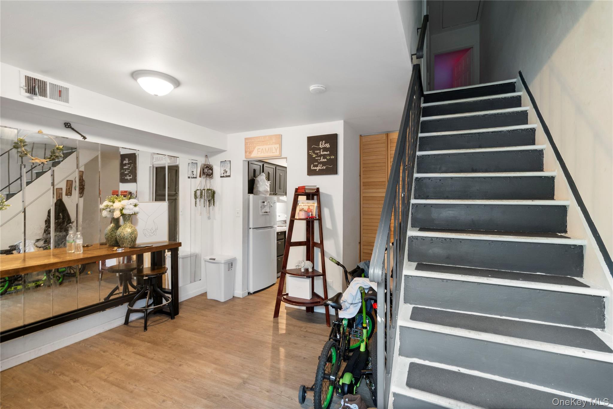 231 Hill Rise Calverton, NY 11933 - Photo 3 of 14 a view of a room with gym equipment