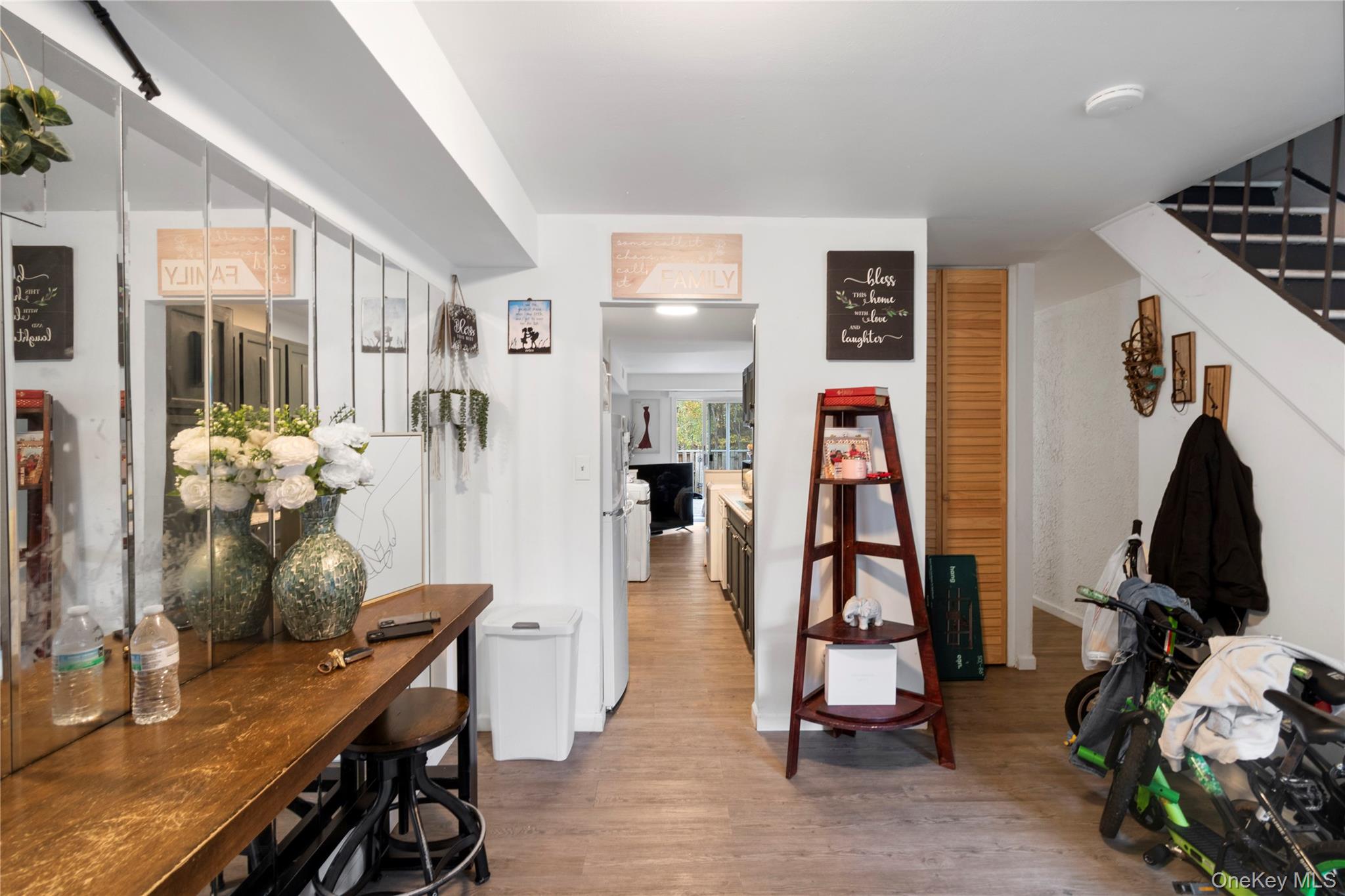 231 Hill Rise Calverton, NY 11933 - Photo 4 of 14 a view of a room with gym equipment