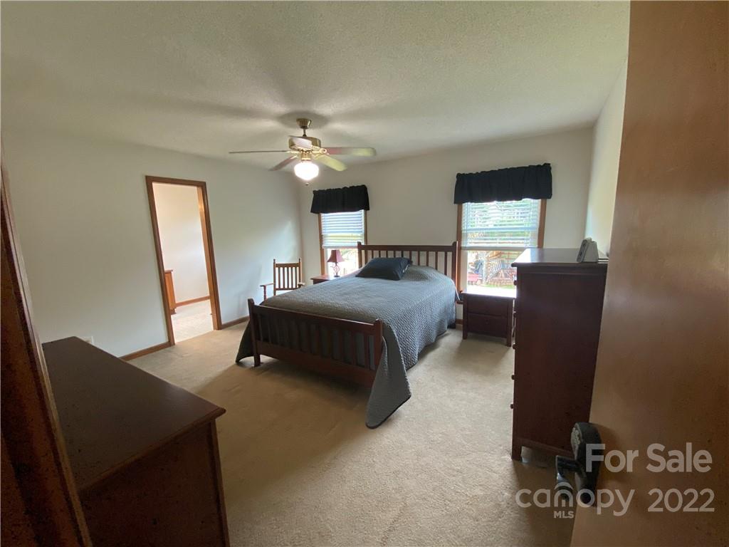 1539 Cobblestone Court Fort Mill, SC 29708 - Photo 24 of 41 a bedroom with a bed furniture and a window