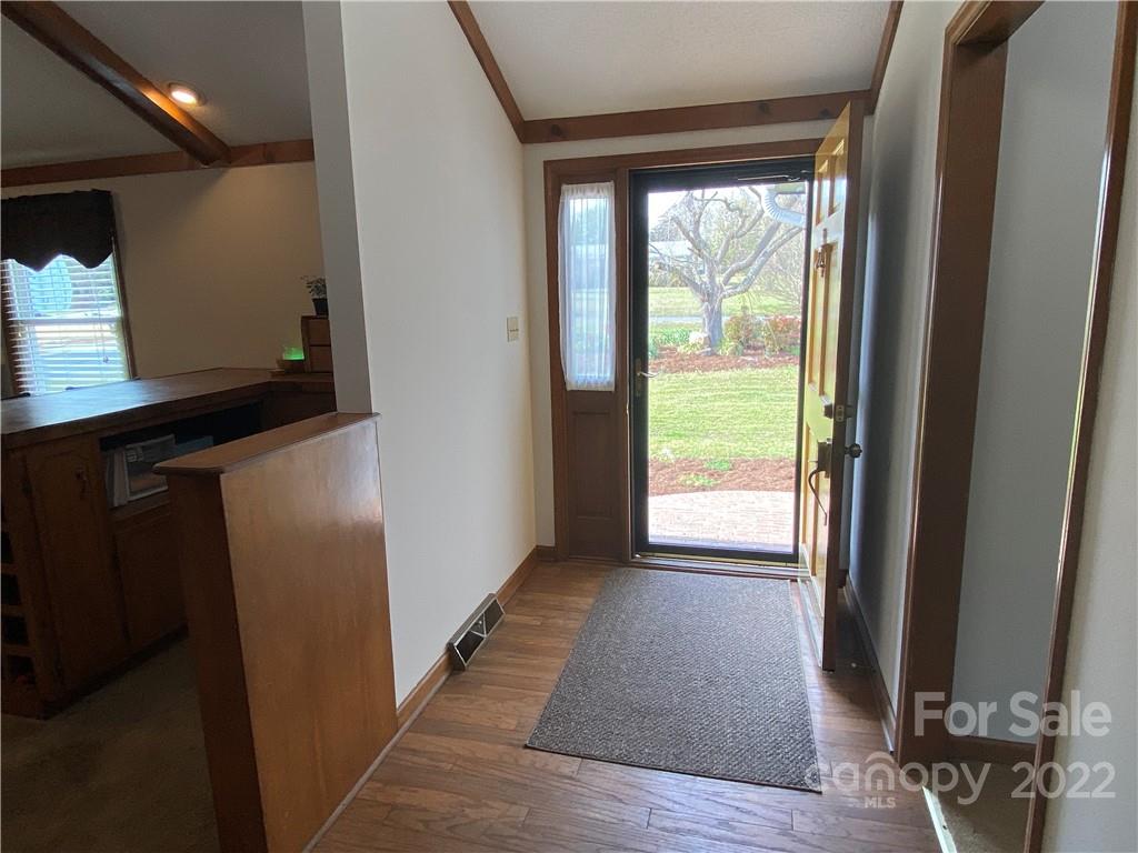1539 Cobblestone Court Fort Mill, SC 29708 - Photo 6 of 41 a view of a room with wooden floor and windows