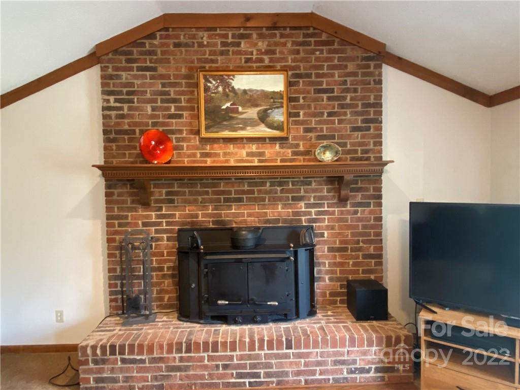 1539 Cobblestone Court Fort Mill, SC 29708 - Photo 9 of 41 a front view of a fireplace with wooden floor