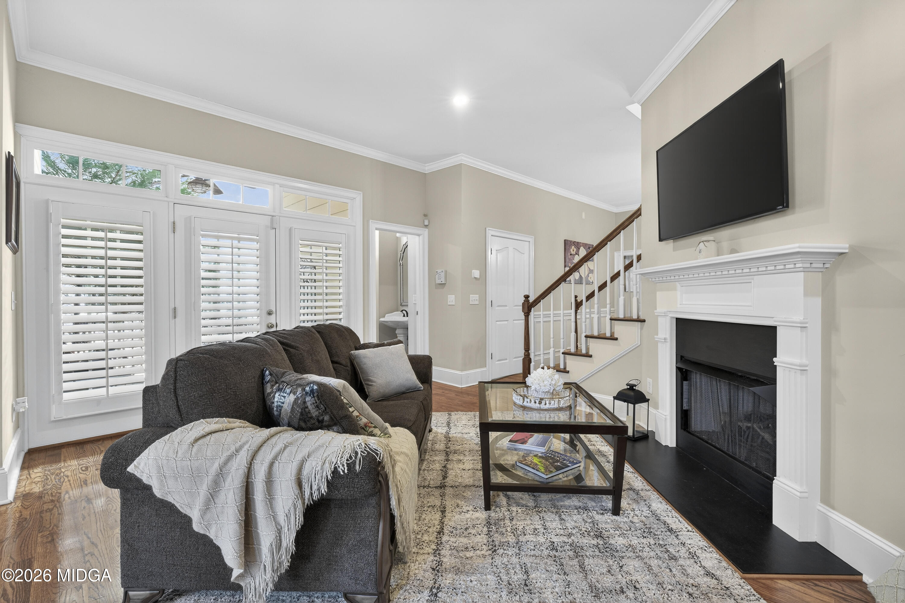 855 Tufthunter Macon, GA 31210 - Photo 11 of 86 a living room with furniture and a flat screen tv