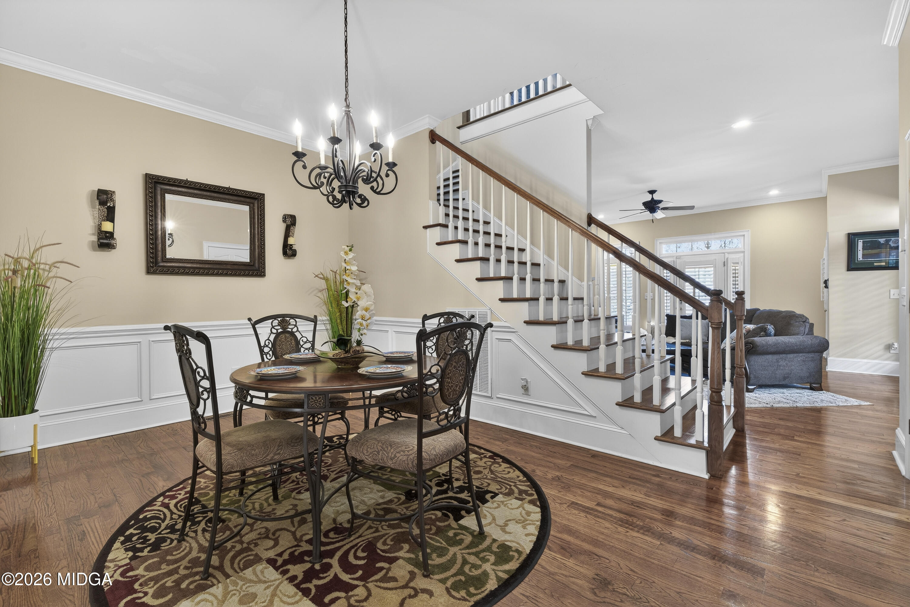 855 Tufthunter Macon, GA 31210 - Photo 14 of 87 a view of a dining room with furniture wooden floor and a chandelier