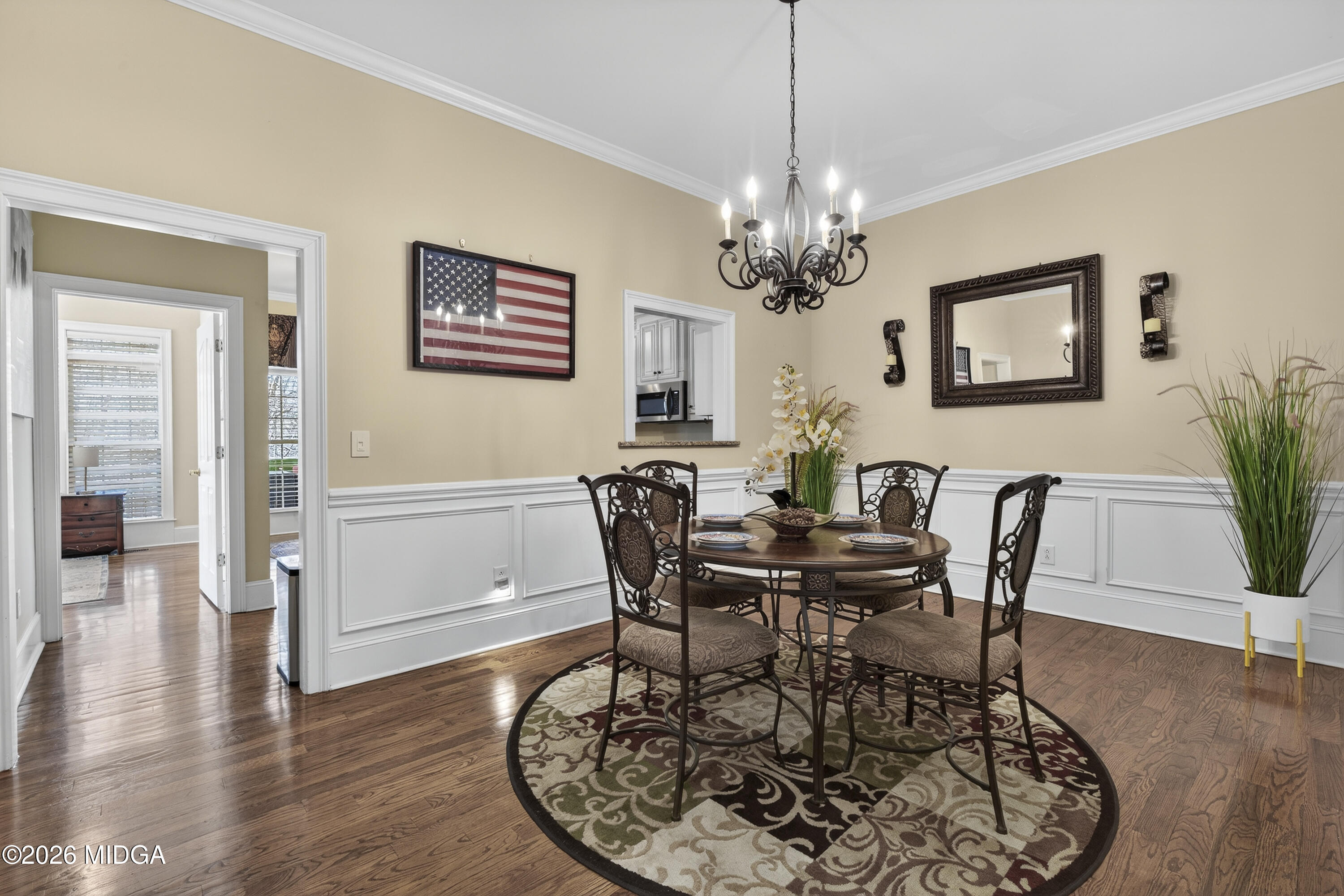 855 Tufthunter Macon, GA 31210 - Photo 15 of 87 a view of a dining room with furniture window and wooden floor