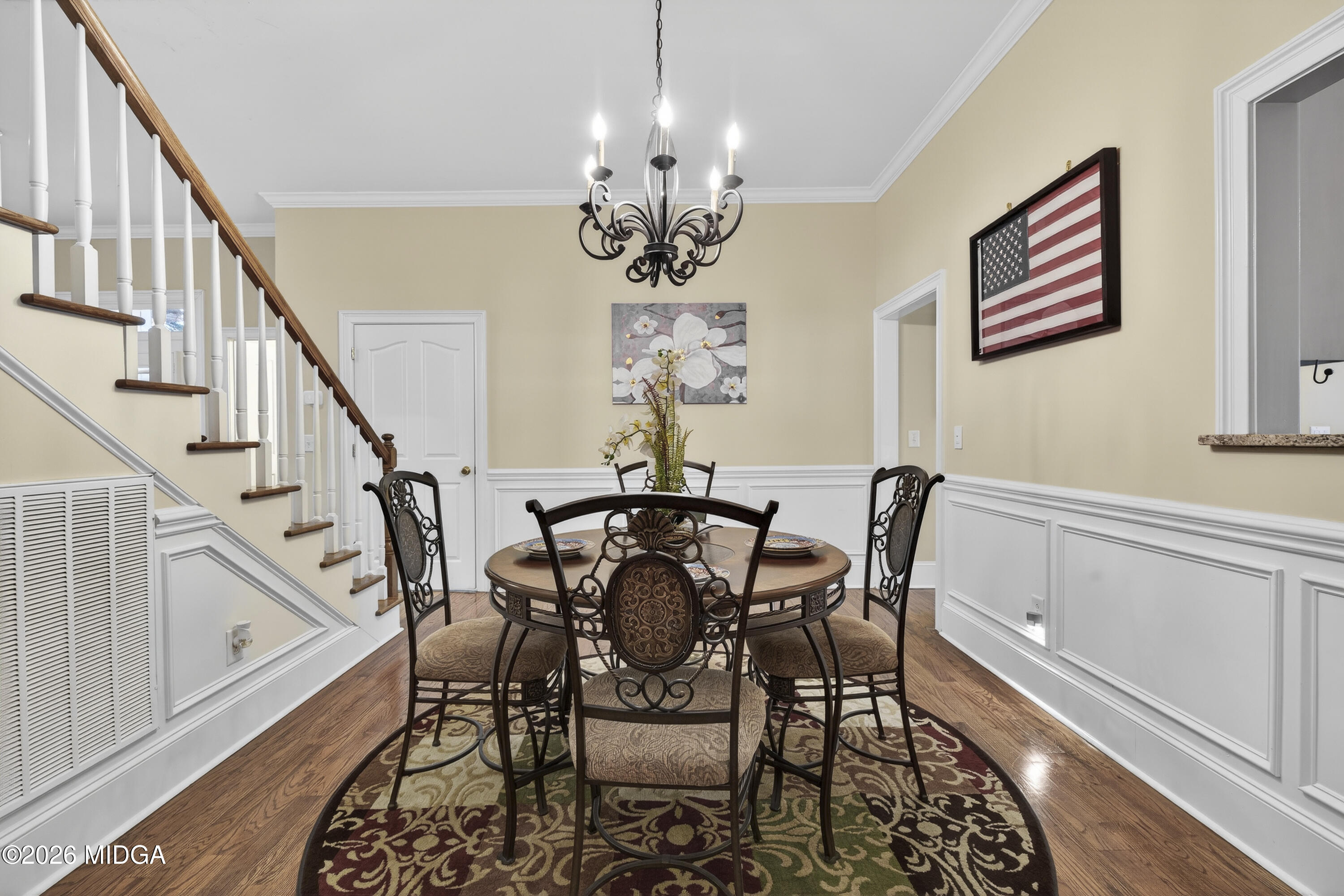 855 Tufthunter Macon, GA 31210 - Photo 17 of 86 a view of a dining room with furniture and a chandelier