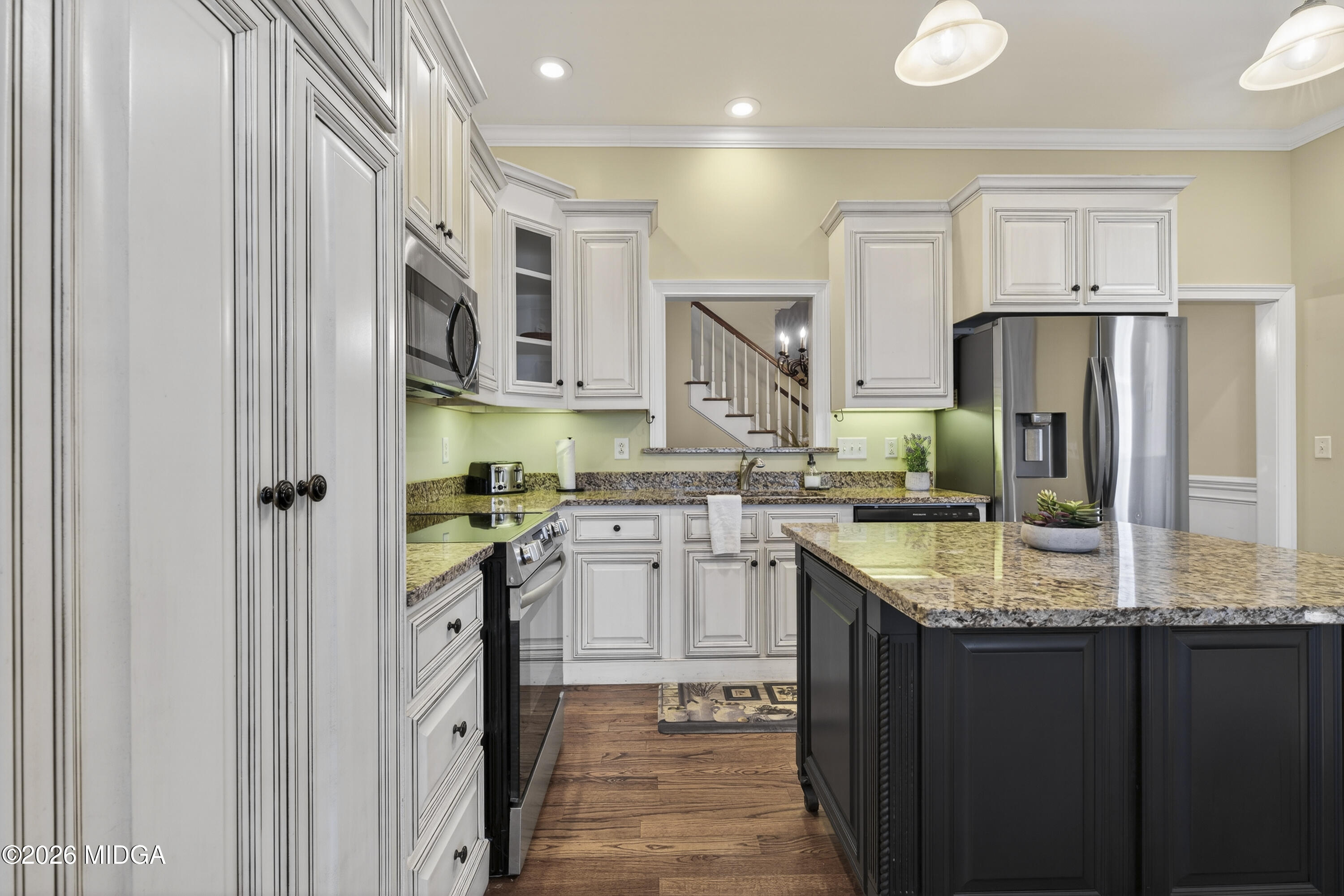 855 Tufthunter Macon, GA 31210 - Photo 21 of 86 a kitchen with stainless steel appliances granite countertop a refrigerator and a sink