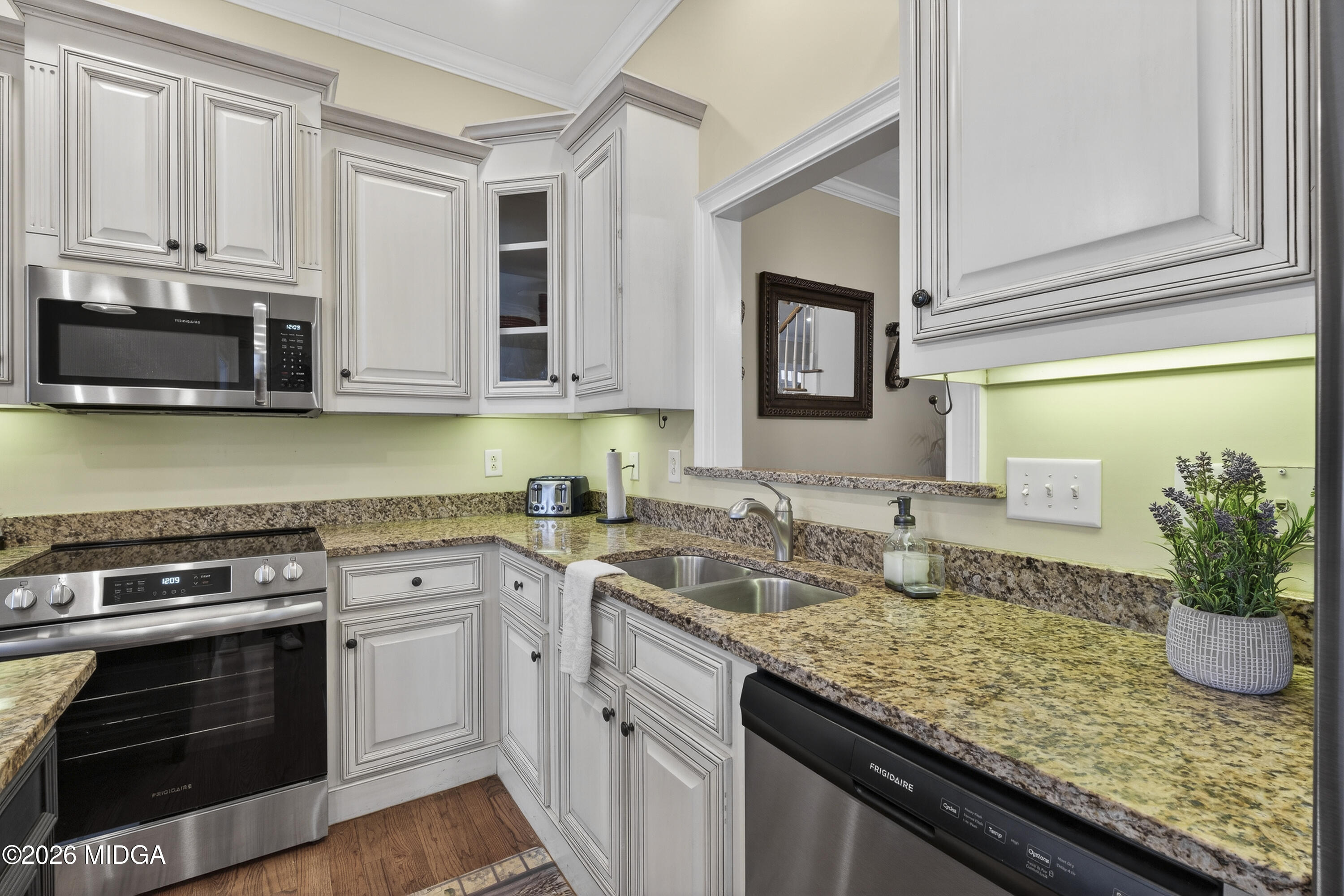 855 Tufthunter Macon, GA 31210 - Photo 24 of 86 a kitchen with granite countertop a sink stainless steel appliances and cabinets