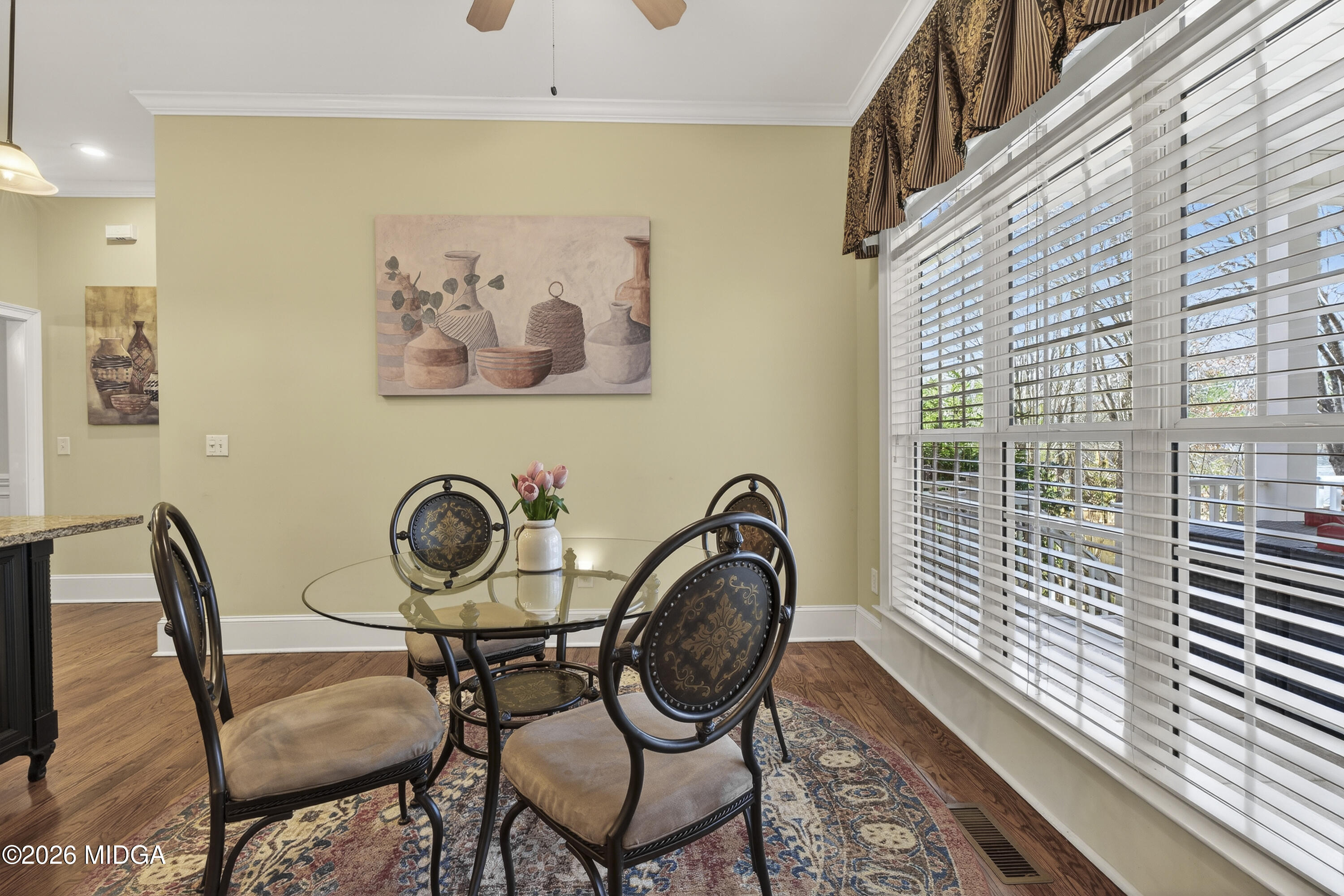 855 Tufthunter Macon, GA 31210 - Photo 29 of 86 a view of a dining room and hall with wooden floor