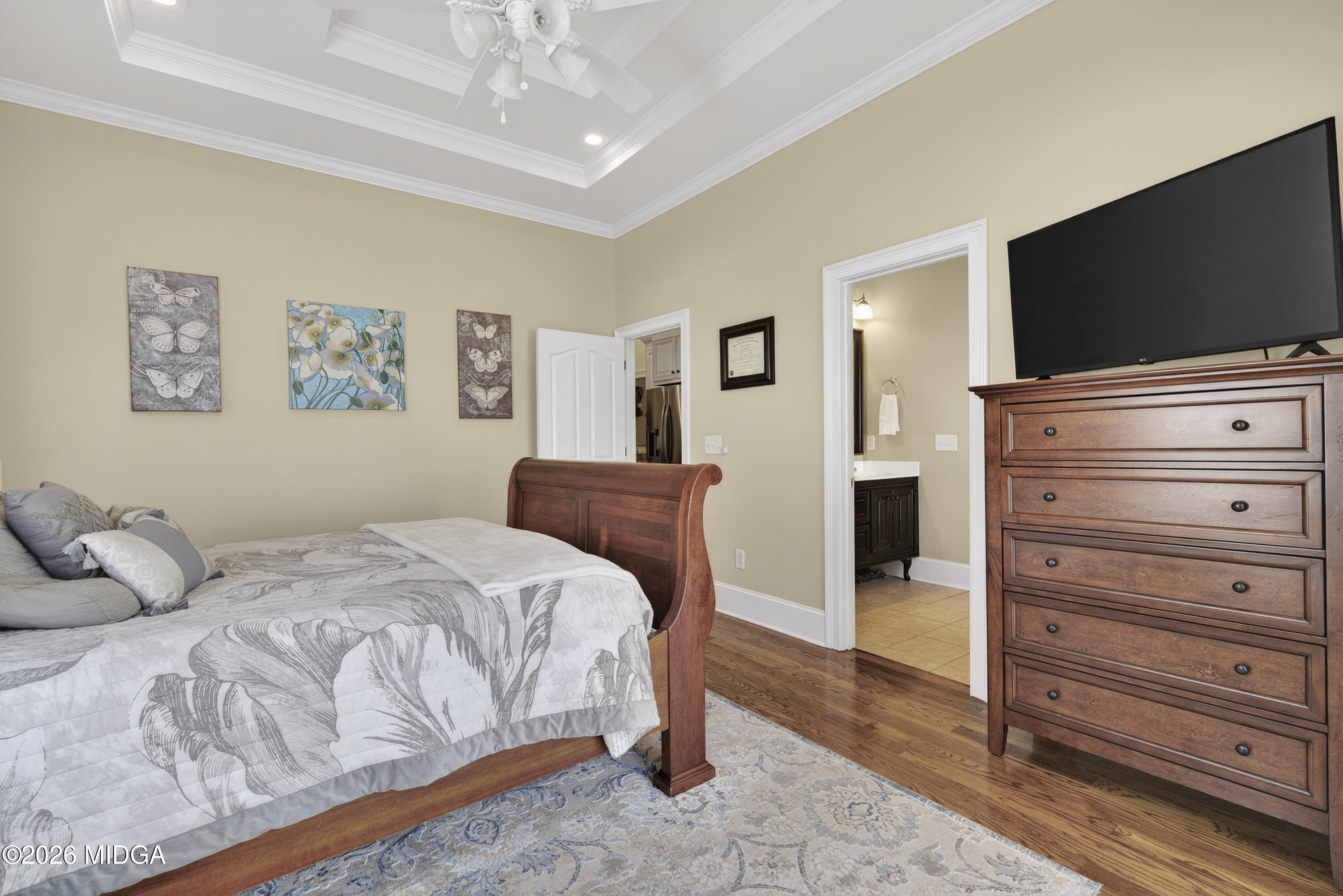 855 Tufthunter Macon, GA 31210 - Photo 31 of 87 a bedroom with a bed and a flat screen tv