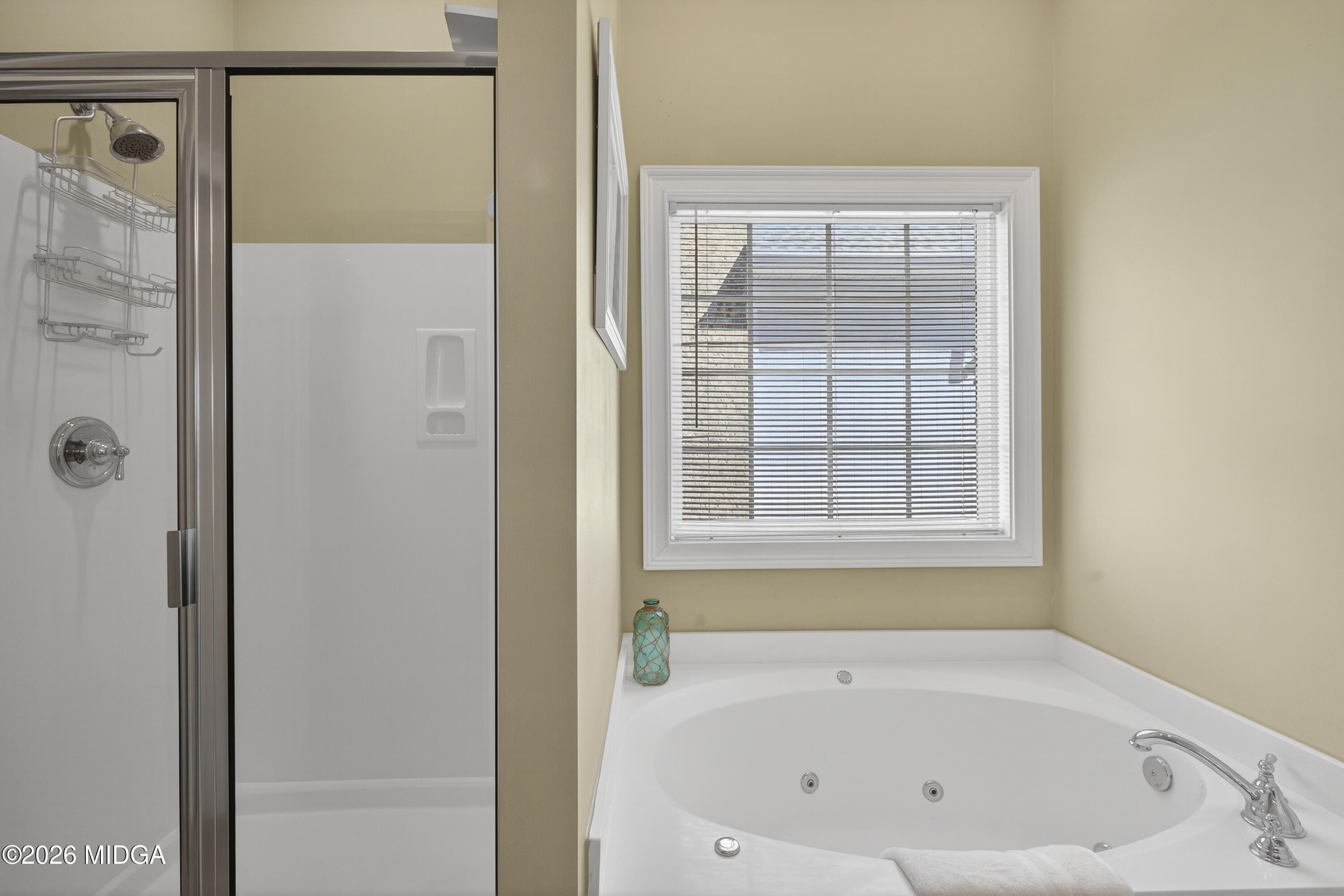 855 Tufthunter Macon, GA 31210 - Photo 37 of 86 a bathroom with a bathtub and a shower