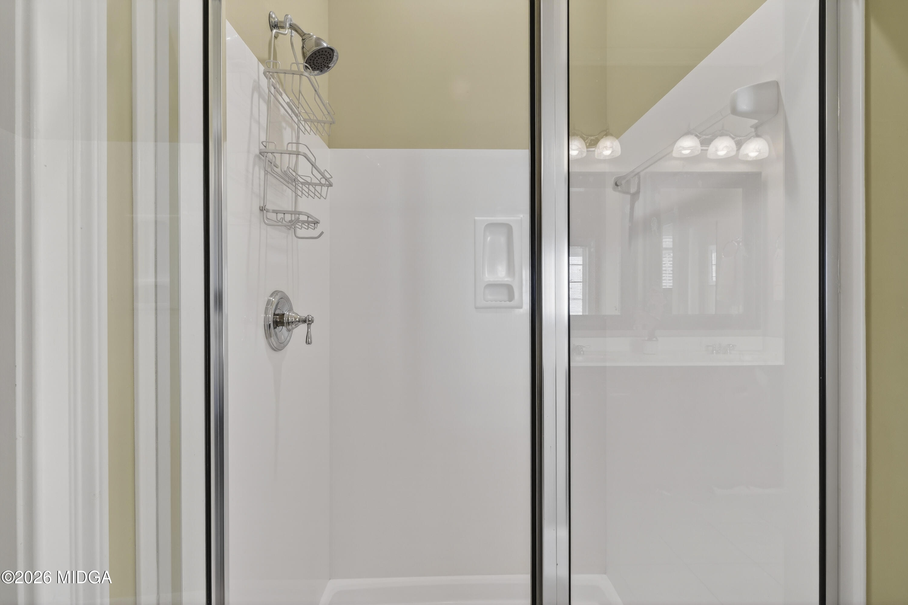 855 Tufthunter Macon, GA 31210 - Photo 39 of 86 a bathroom with a glass shower door