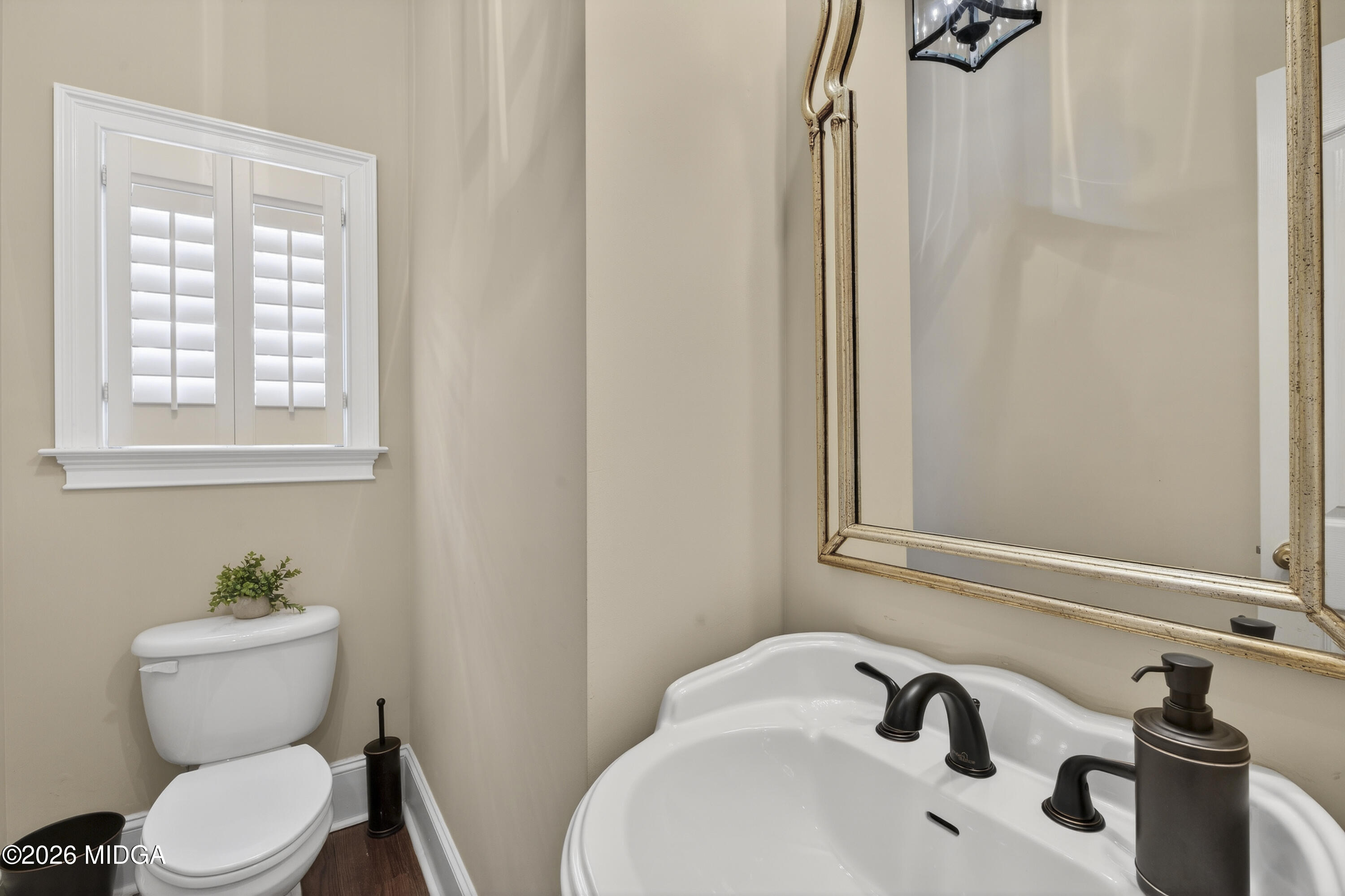 855 Tufthunter Macon, GA 31210 - Photo 43 of 86 a bathroom with a sink toilet and a mirror