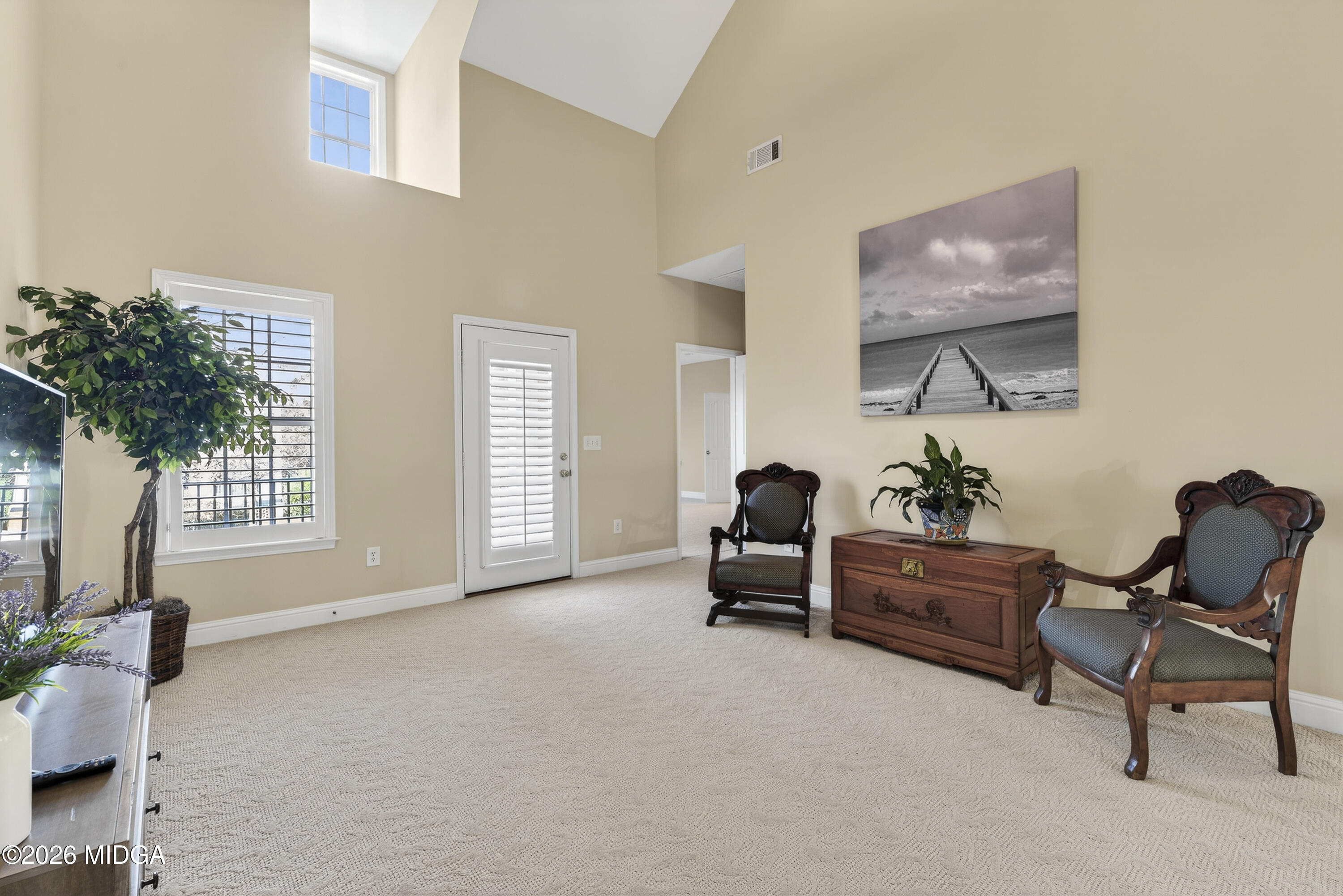 855 Tufthunter Macon, GA 31210 - Photo 50 of 86 a living room with furniture and a potted plant